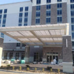 Entrance Lobby Canopy, TOPGAL Standing Seam Panels in Ice