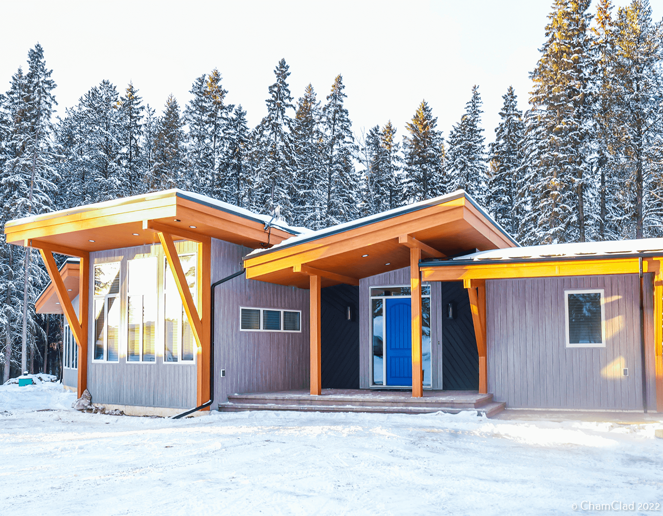 Structure in winter with ChamClad exterior siding
